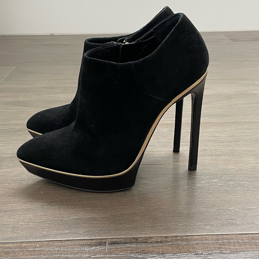 Saint Laurent black suede platform bootie with gold trim, size 35.5